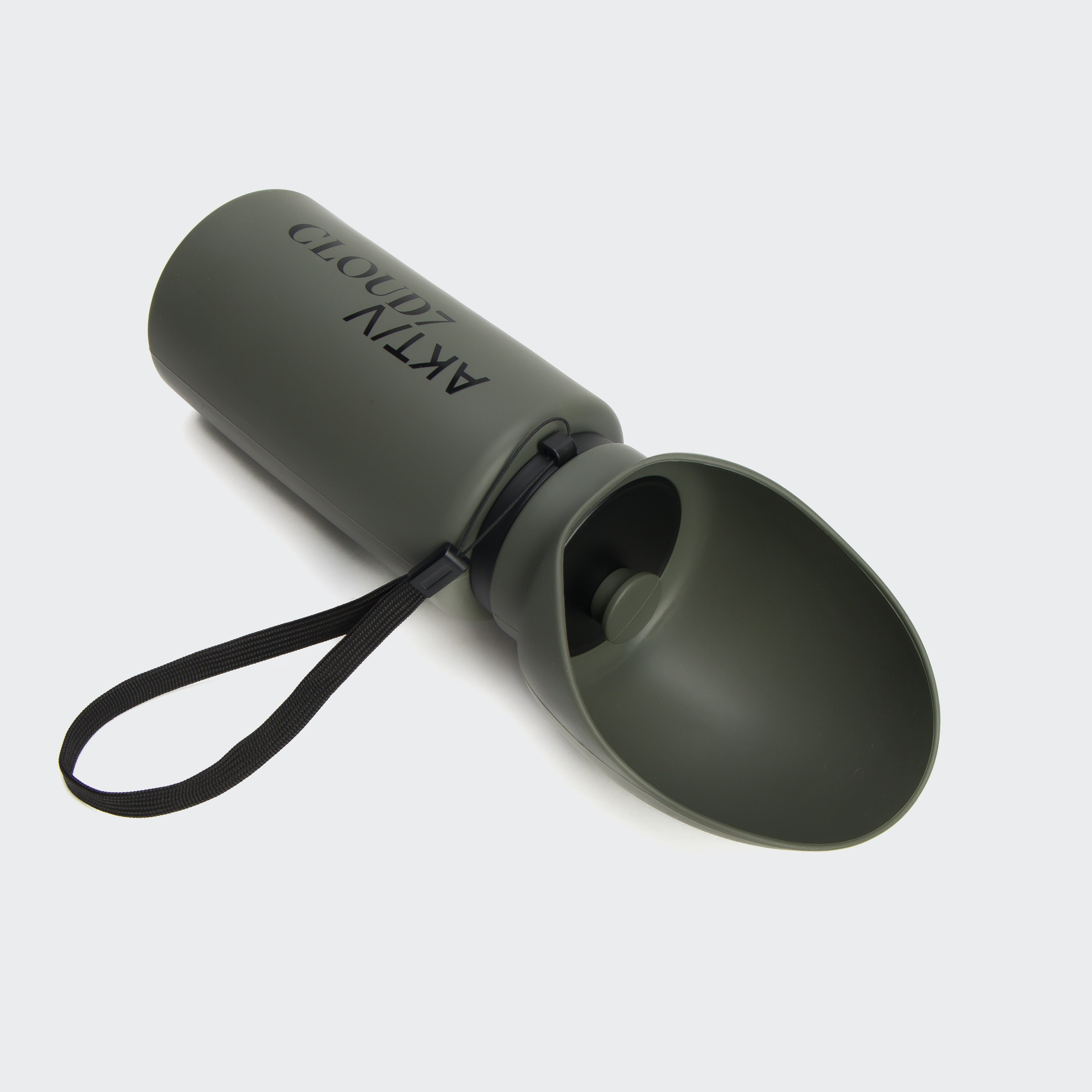 The Cloud7 AKTIV dog drinking bottle in Dark Olive, looking sleek and ready to rescue thirsty, adventurous pups on the go.