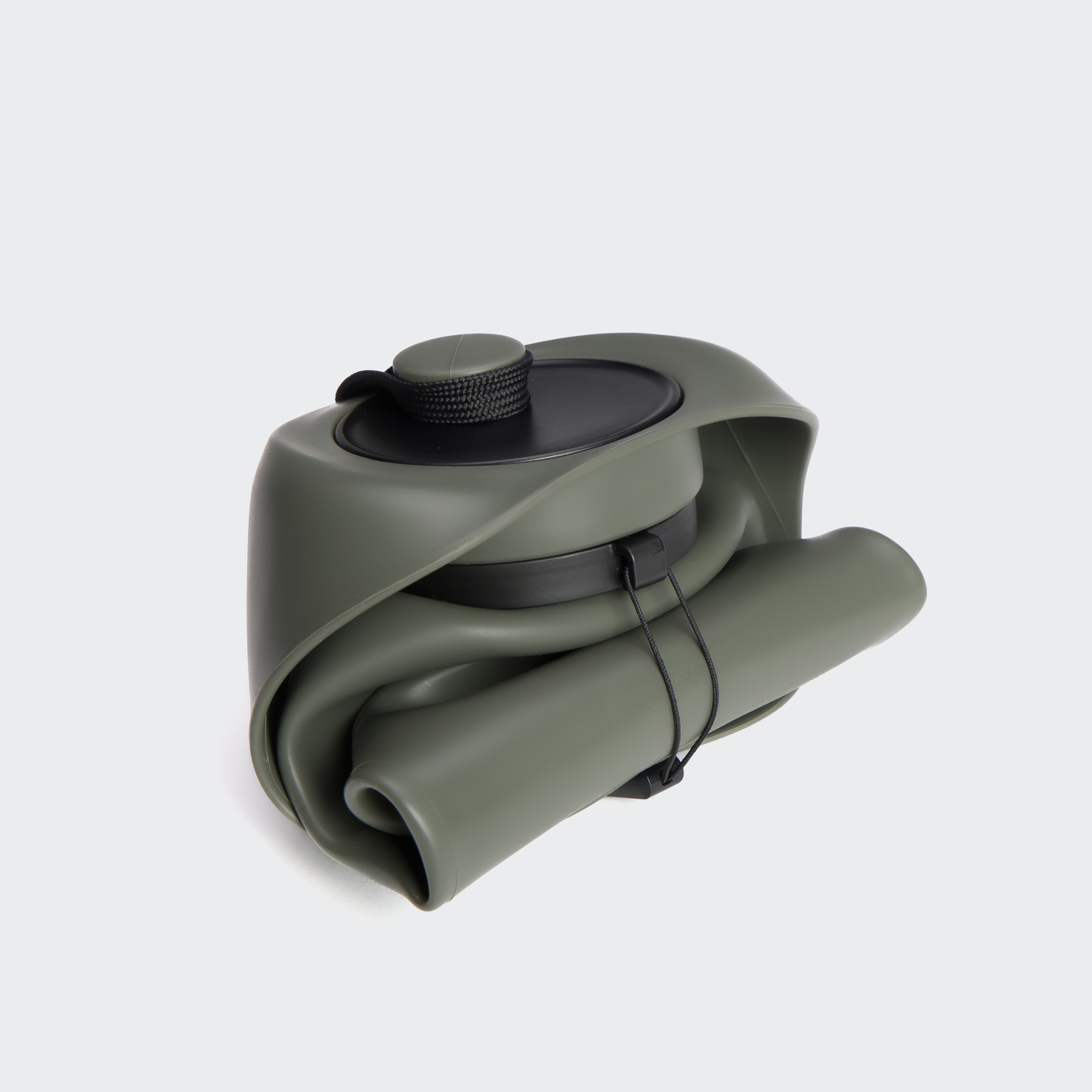 The Cloud7 AKTIV dog drinking bottle in Dark Olive, looking sleek and ready to rescue thirsty, adventurous pups on the go.