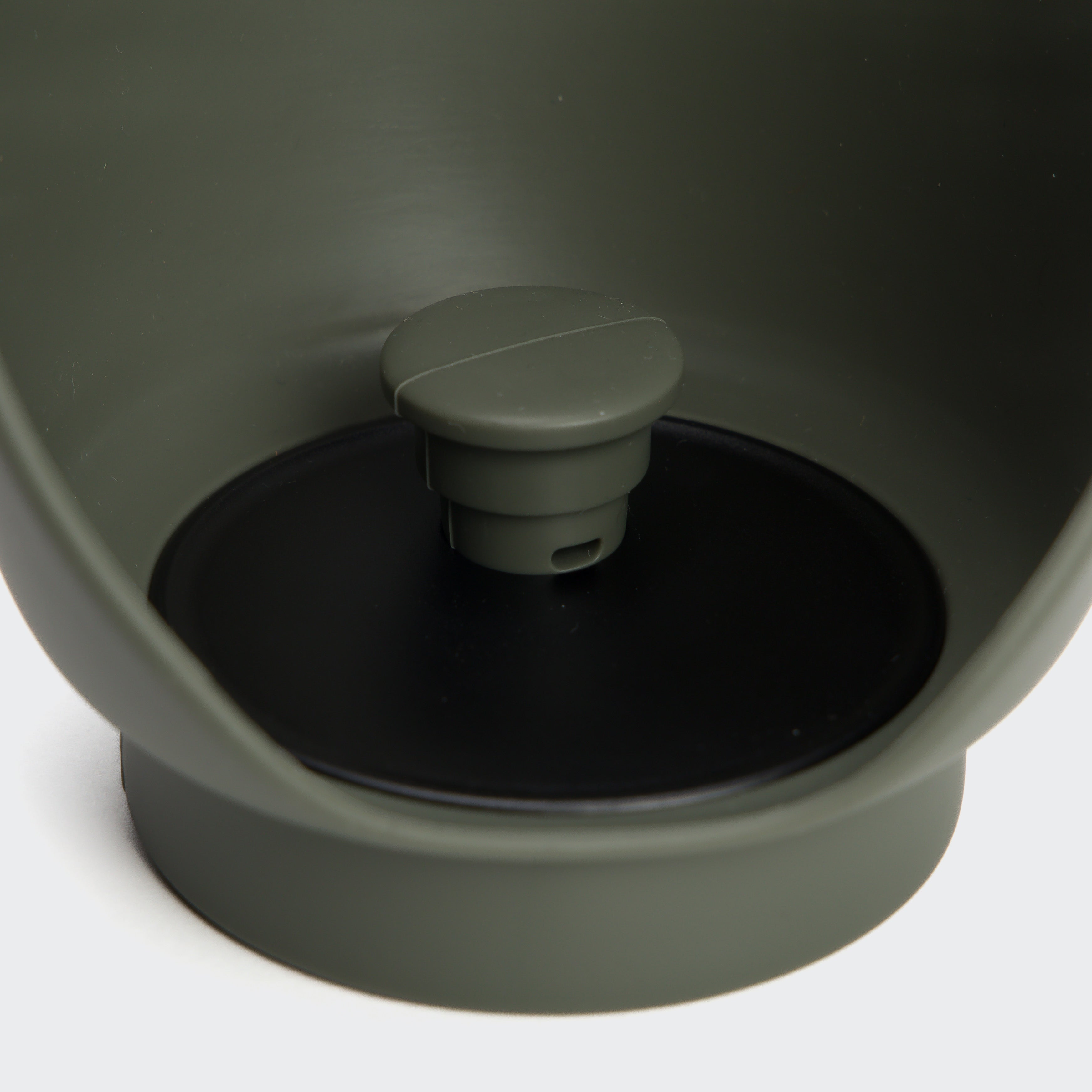 The Cloud7 AKTIV dog drinking bottle in Dark Olive, looking sleek and ready to rescue thirsty, adventurous pups on the go.
