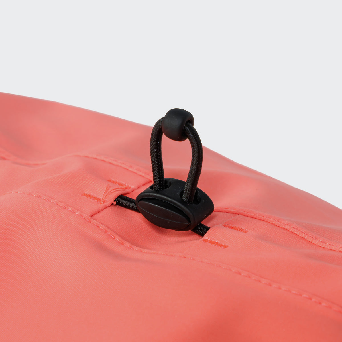 Cloud7 AKTIV reflective dog raincoat in high-visibility color, showcasing the extended shape and relaxed cut for full body coverage on a dog.