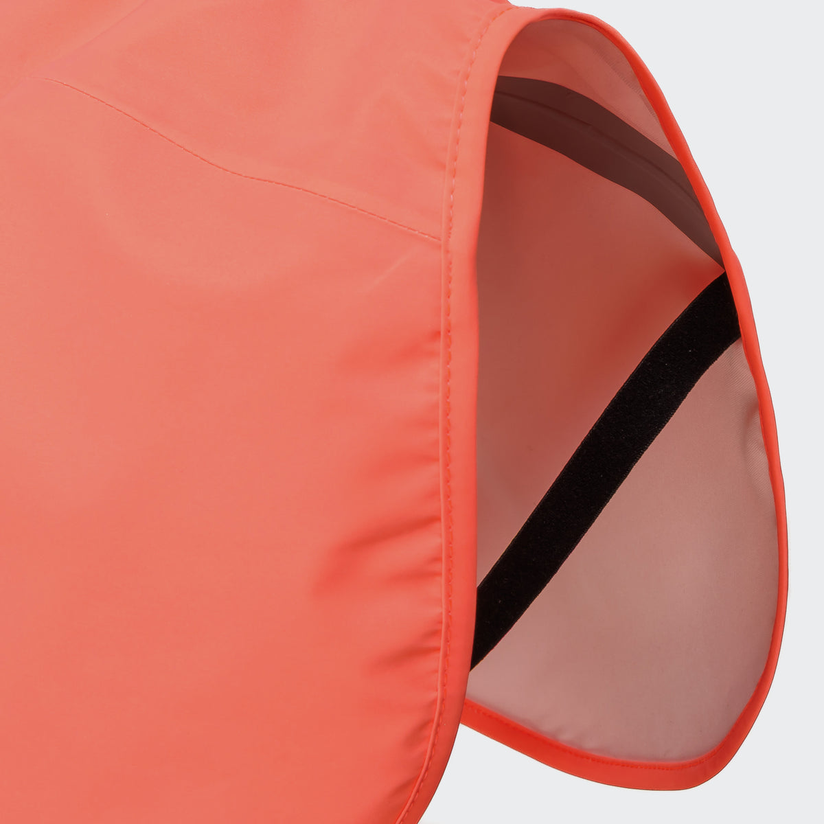 Cloud7 AKTIV reflective dog raincoat in high-visibility color, showcasing the extended shape and relaxed cut for full body coverage on a dog.