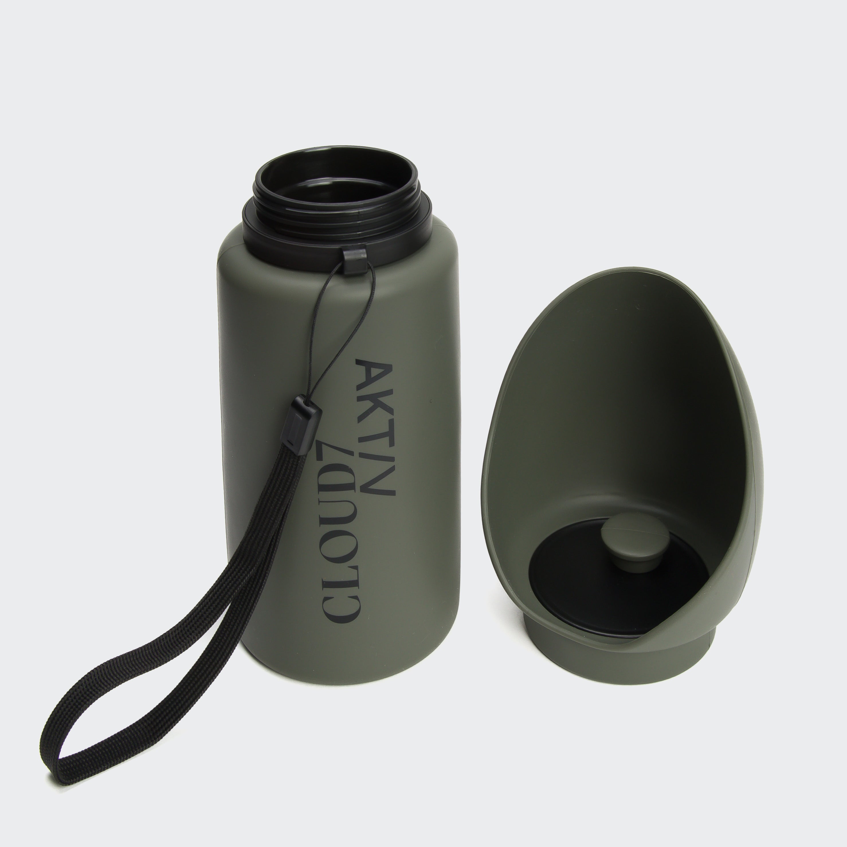 The Cloud7 AKTIV dog drinking bottle in Dark Olive, looking sleek and ready to rescue thirsty, adventurous pups on the go.
