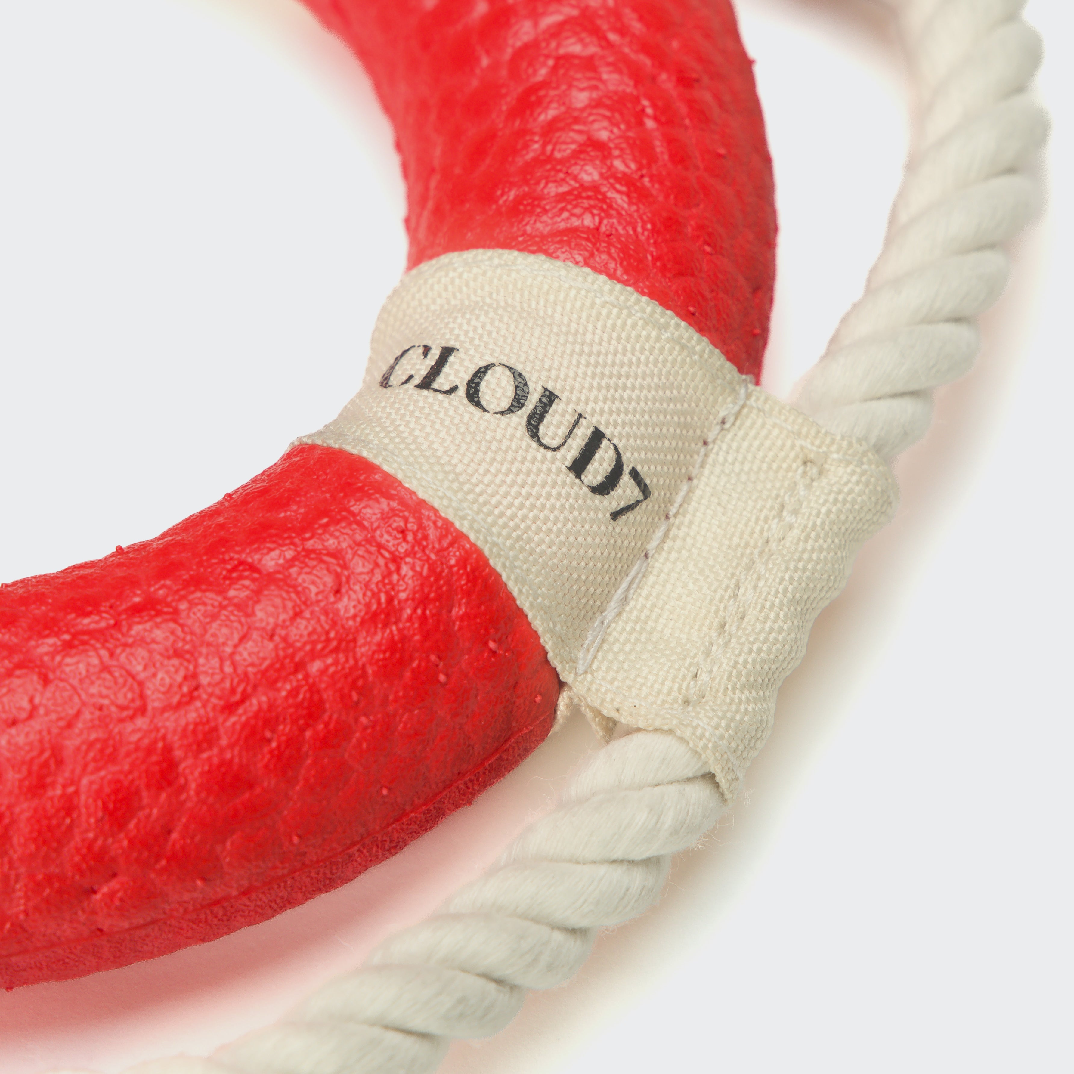Cloud7 Floaty lifebuoy dog toy in bright orange with durable cotton rope for fetch and water play.