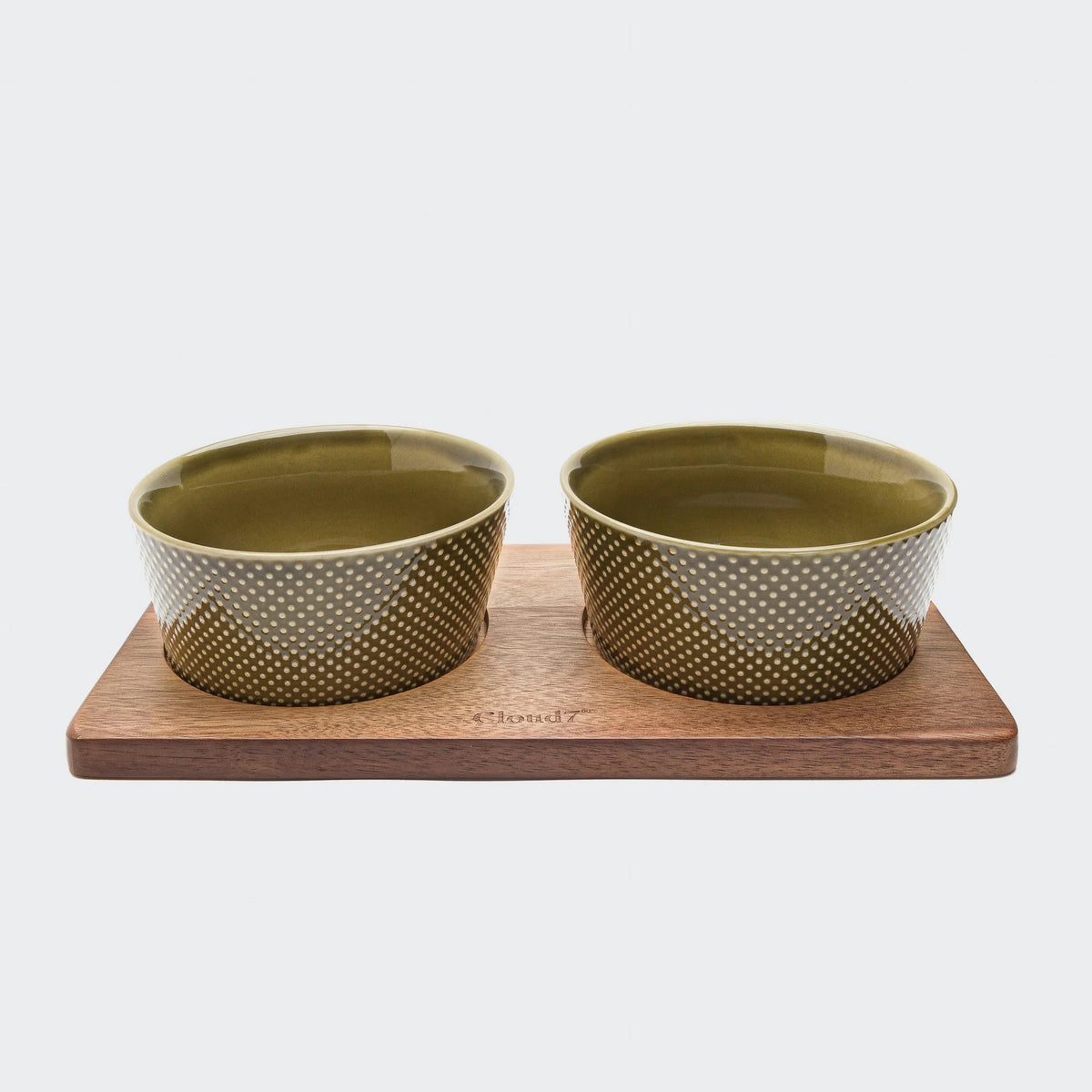 Cloud7 Mauro sustainable mango wood dog feeding station in a dark brown stained finish holding pet bowls