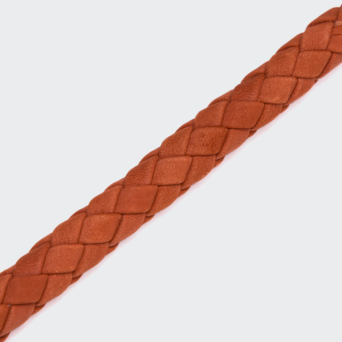 Cloud7 Ravello rust braided leather dog collar with solid brass hardware, showcasing the round nubuck weave design.