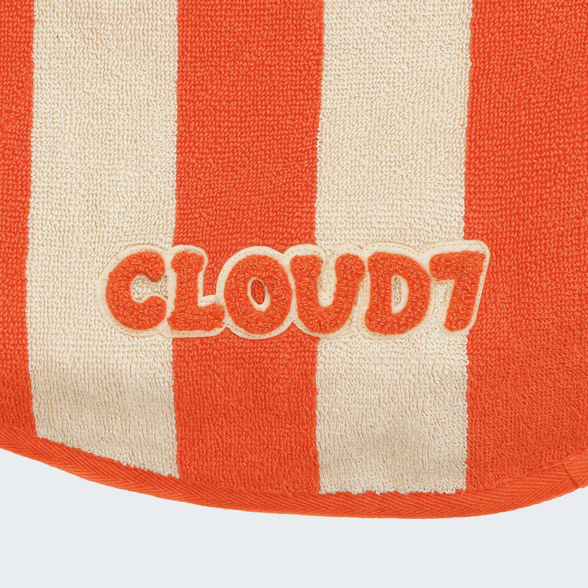 Cloud7 Wannsee dog bathrobe in a beige and orange striped pattern made from absorbent organic cotton terry cloth.