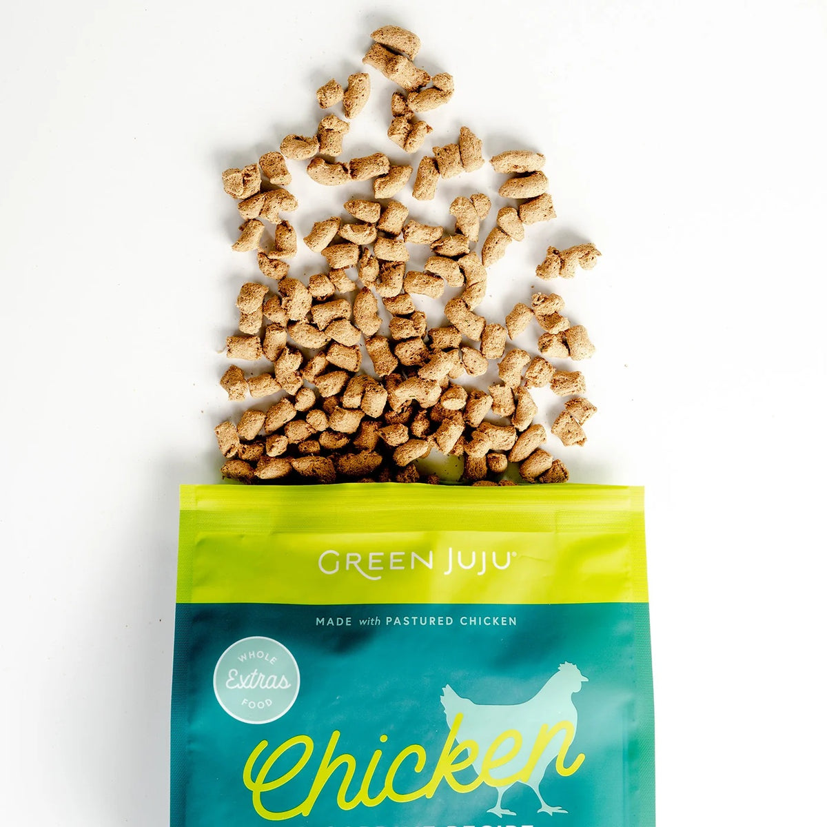Low-carb Green Juju freeze-dried raw chicken and sardine pet food nuggets rich in antioxidants.