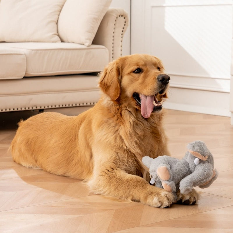 Tall Tails Animated Elephant plush pet toy showing the reinforced mesh fabric and protective squeaker pouch.
