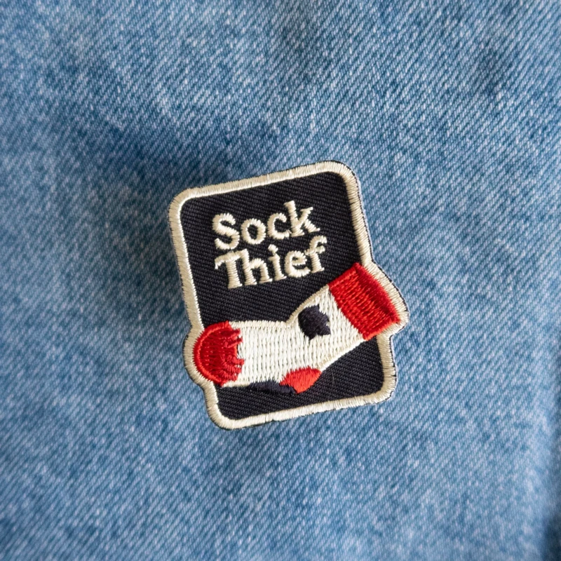 Dog Merit Badges: Sock Thief
